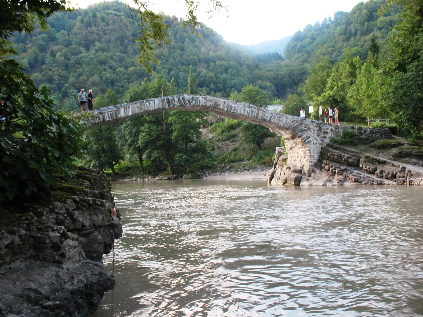 The arched stone Queen Tamar bridge over the river near Makhuntseti