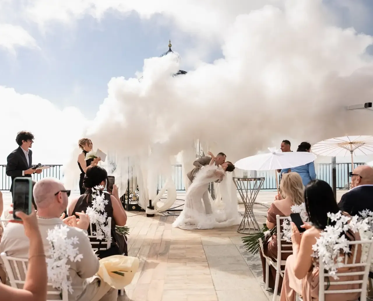 A wedding ceremony on a terrace with a smoke effect, hosted by Maks Vetlov